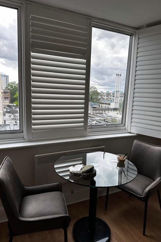 Move in clean in Swiss Cottage, London — dining area, table, chairs and window shutters cleaned